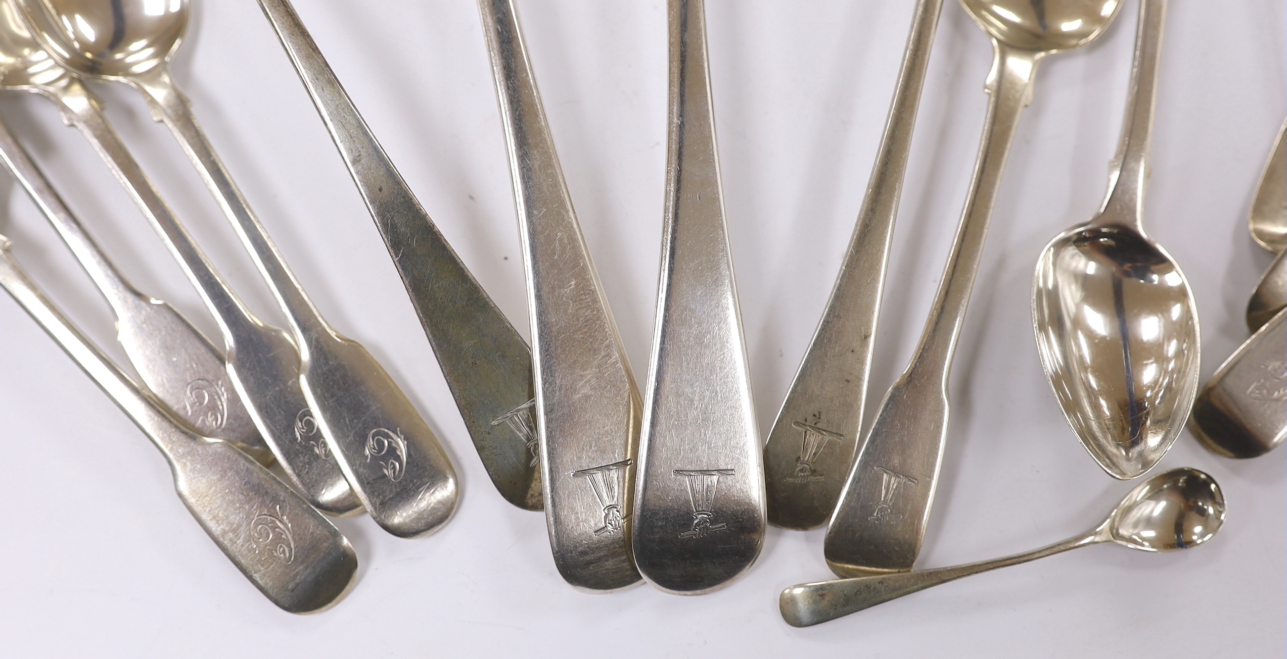 Fourteen assorted 19th century silver spoons, including table, tea and condiment and part of another silver spoons, 12.2oz.